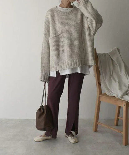 Pull oversize avec poches et coupe ample de couleur claire